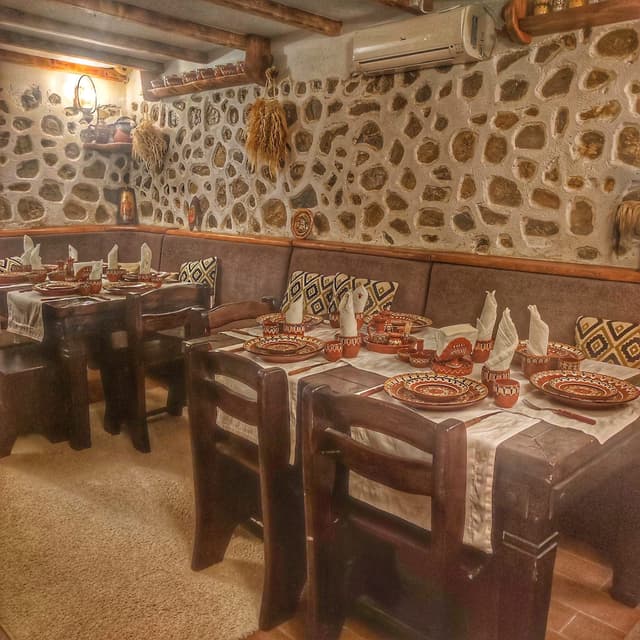 Dining room with wooden table and chairs
