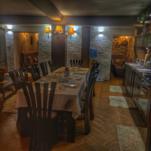 Dining room with wooden table and chairs